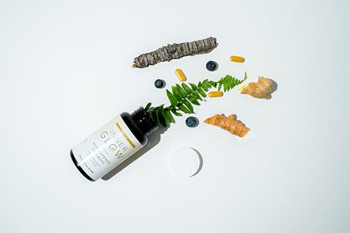 Inner Glow Age Defense ingredients scene featuring Polypodium Leucotomos and berries.