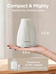 InnoGear ultrasonic diffuser shown in a bedroom for quiet humidification.