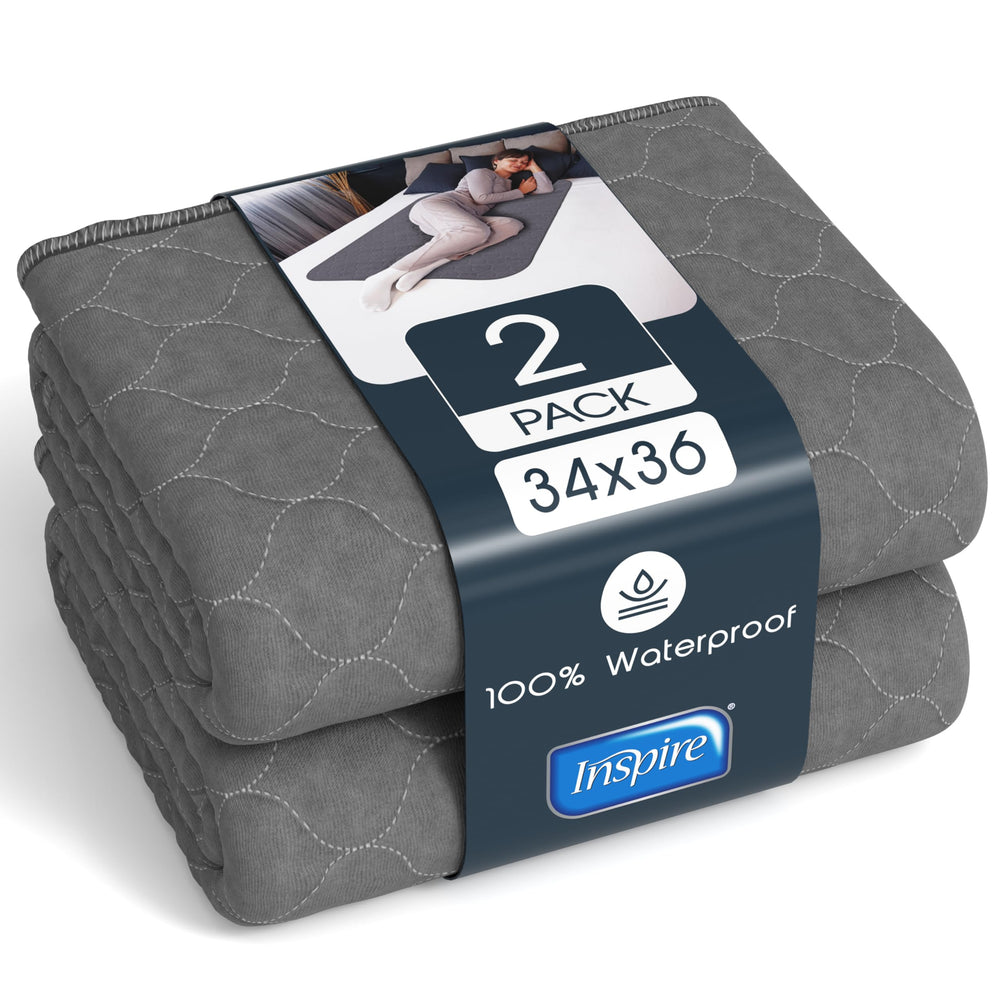 Inspire Underpads gray stain-hiding 34x36 two-pack on bed setup