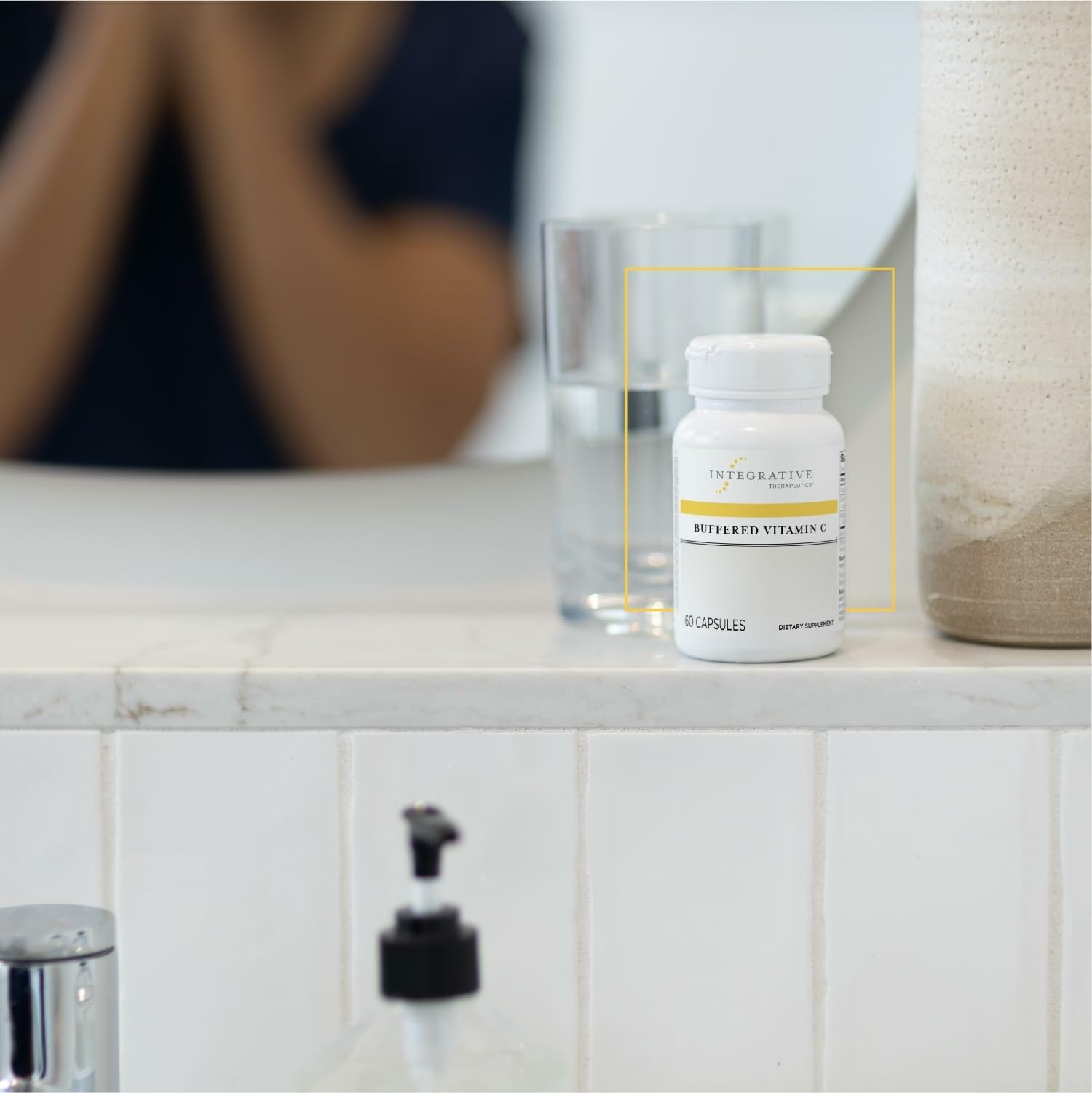 Close-up of Integrative Therapeutics Buffered Vitamin C capsules