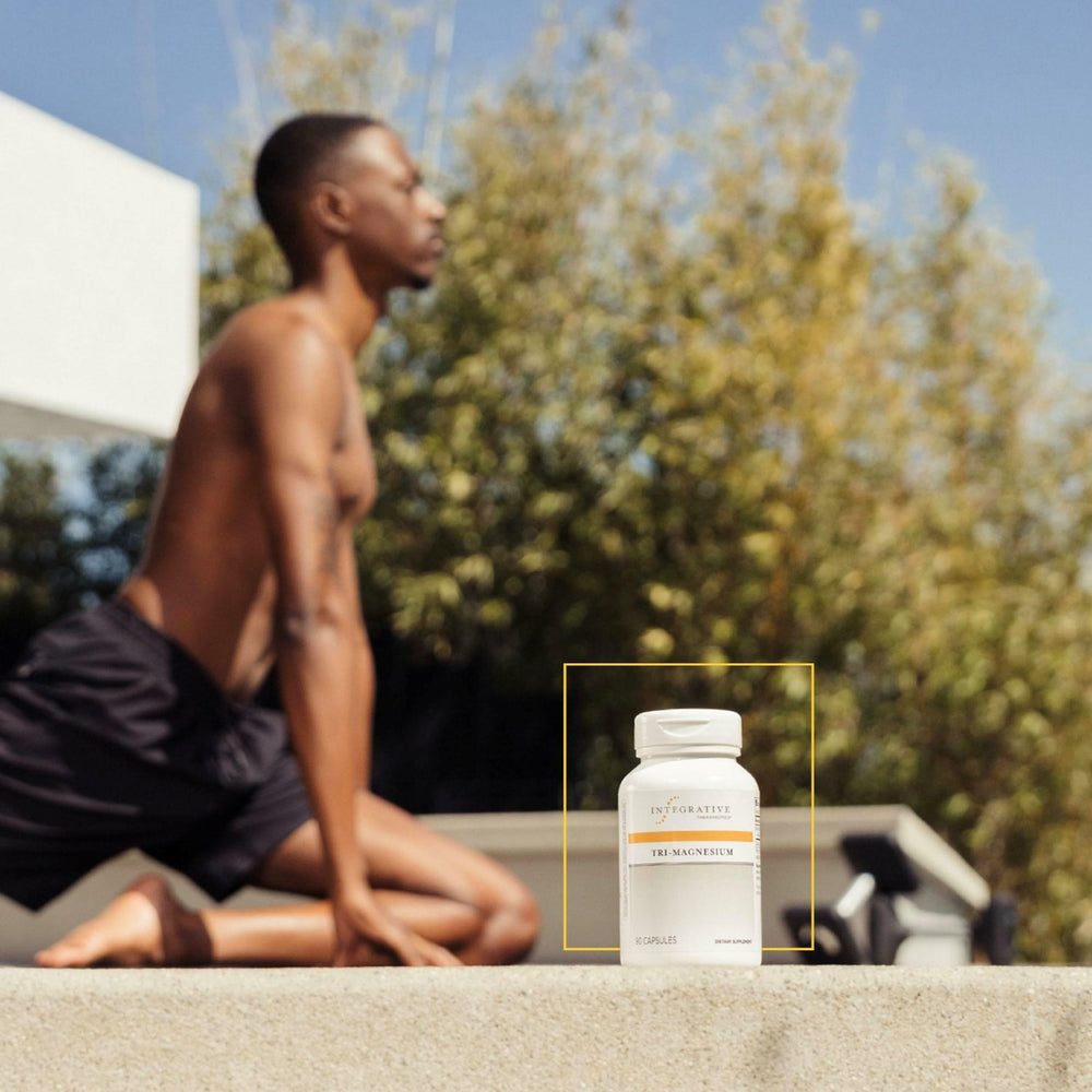 Integrative Therapeutics Tri-Magnesium packaging on shelf with clean design.