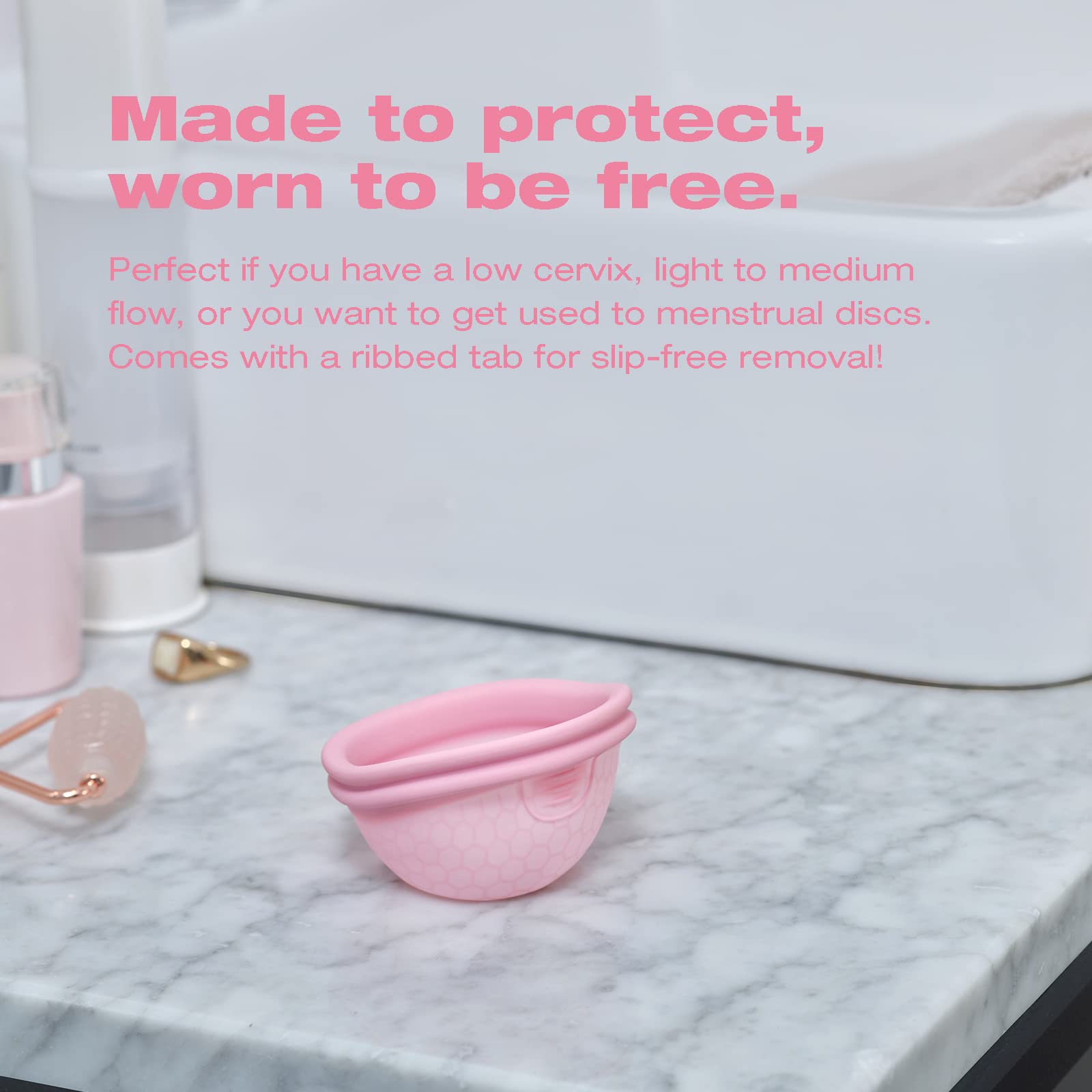 INTIMINA Ziggy Cup 2 ribbed tab for slip-free removal during activities.