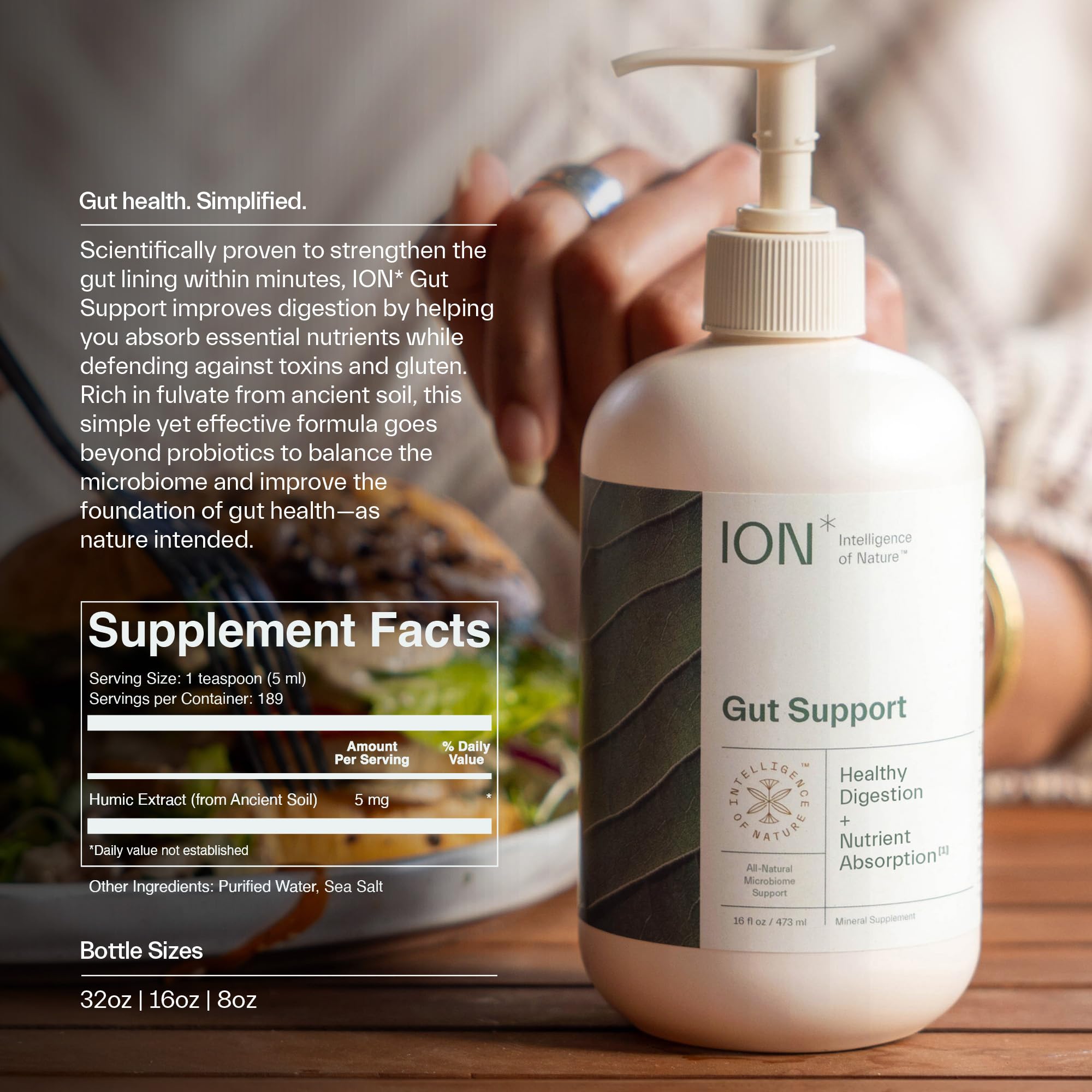 Glass of water beside ION* Gut Support bottle during a routine