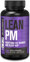 Jacked Factory Lean PM night bottle on a bedside table for restful sleep.
