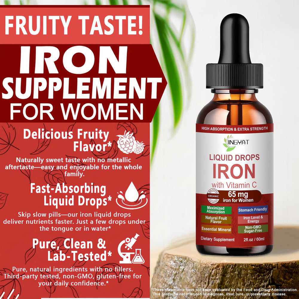 Fruit-flavored JINGYAT iron drops near glass in sunlight.