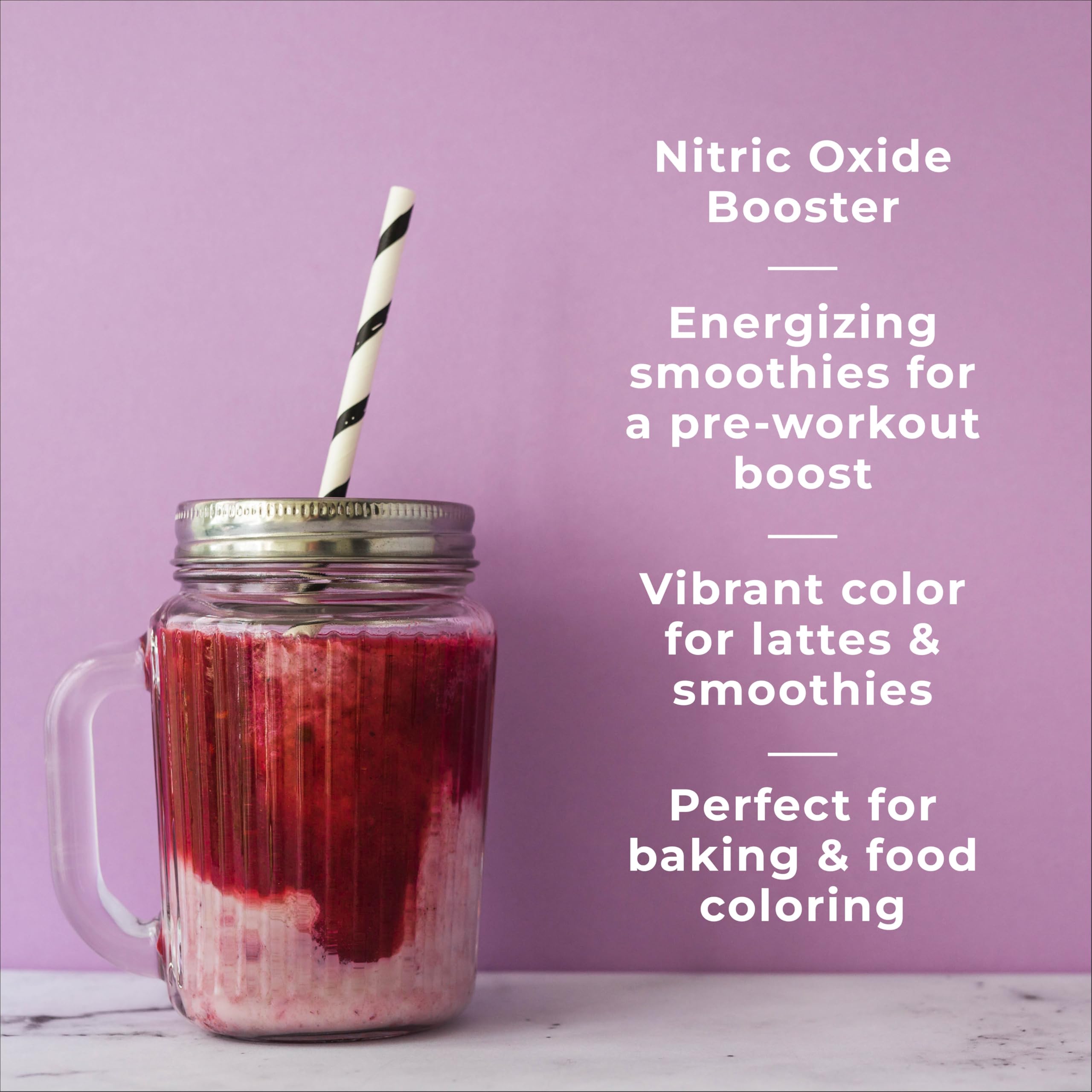 Jiva Organics beet root powder poured into glass shows rich hue.