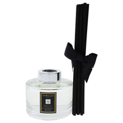 Jo Malone diffuser closeup highlighting pear and freesia notes for a fresh ambiance