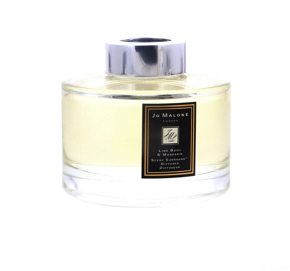 Jo Malone Lime Basil & Mandarin diffuser setup in a cozy living room.