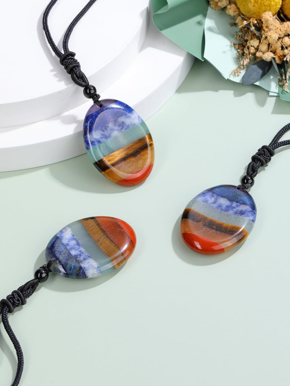 Jovivi necklace worn during yoga to support serenity and concentration