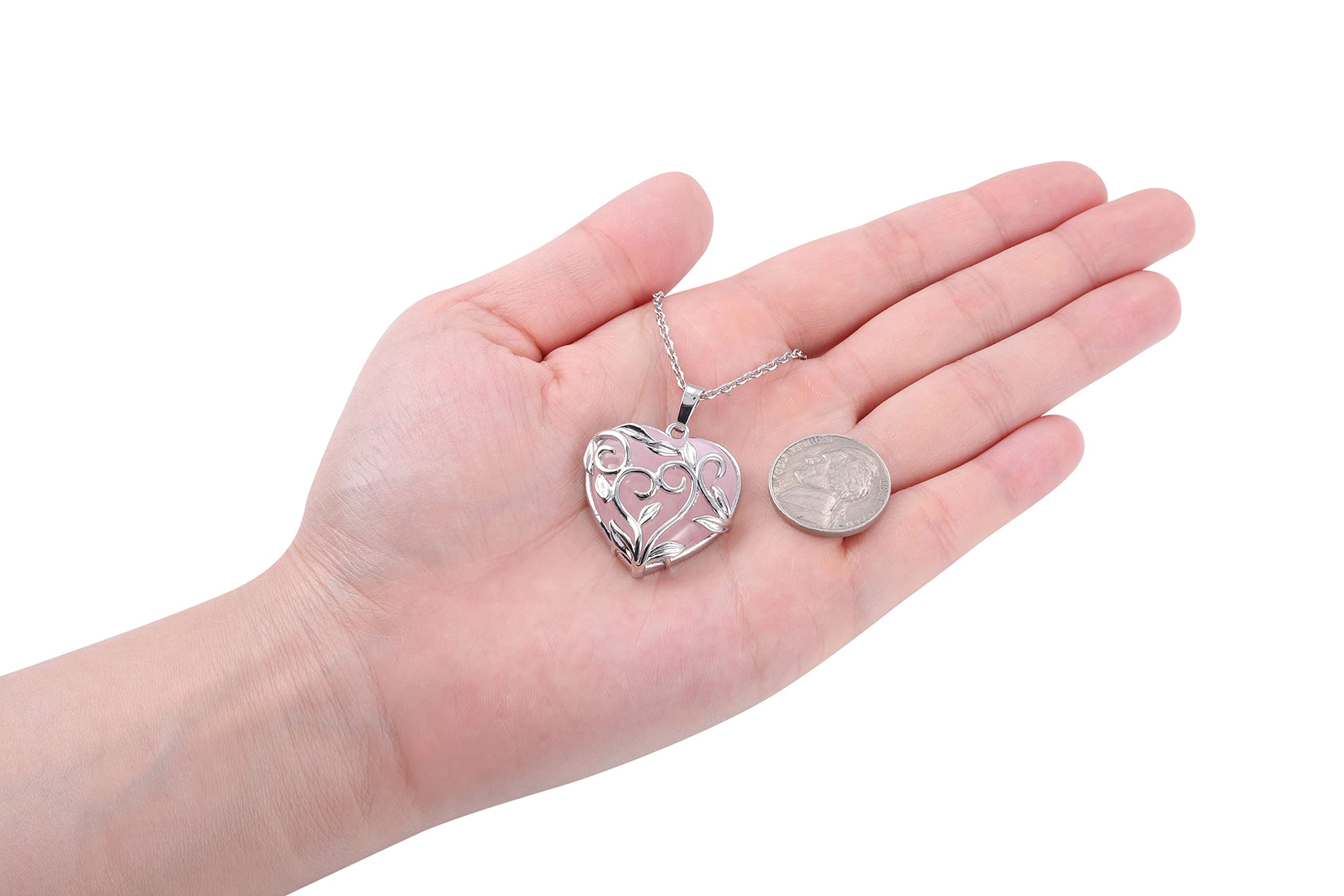 Jovivi rose quartz heart chain worn for subtle glow.