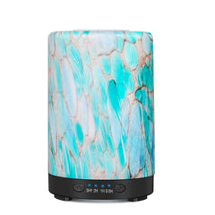 JOYOLO essential oil diffuser in blue mountain glass enhances ambience in living rooms
