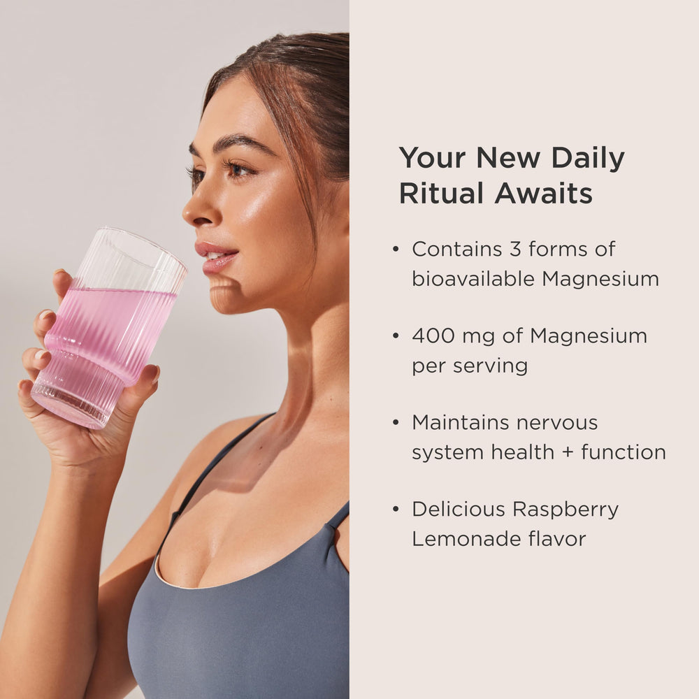 Scoop of JSHealth Magnesium+ powder beside raspberry lemonade for easy daily use