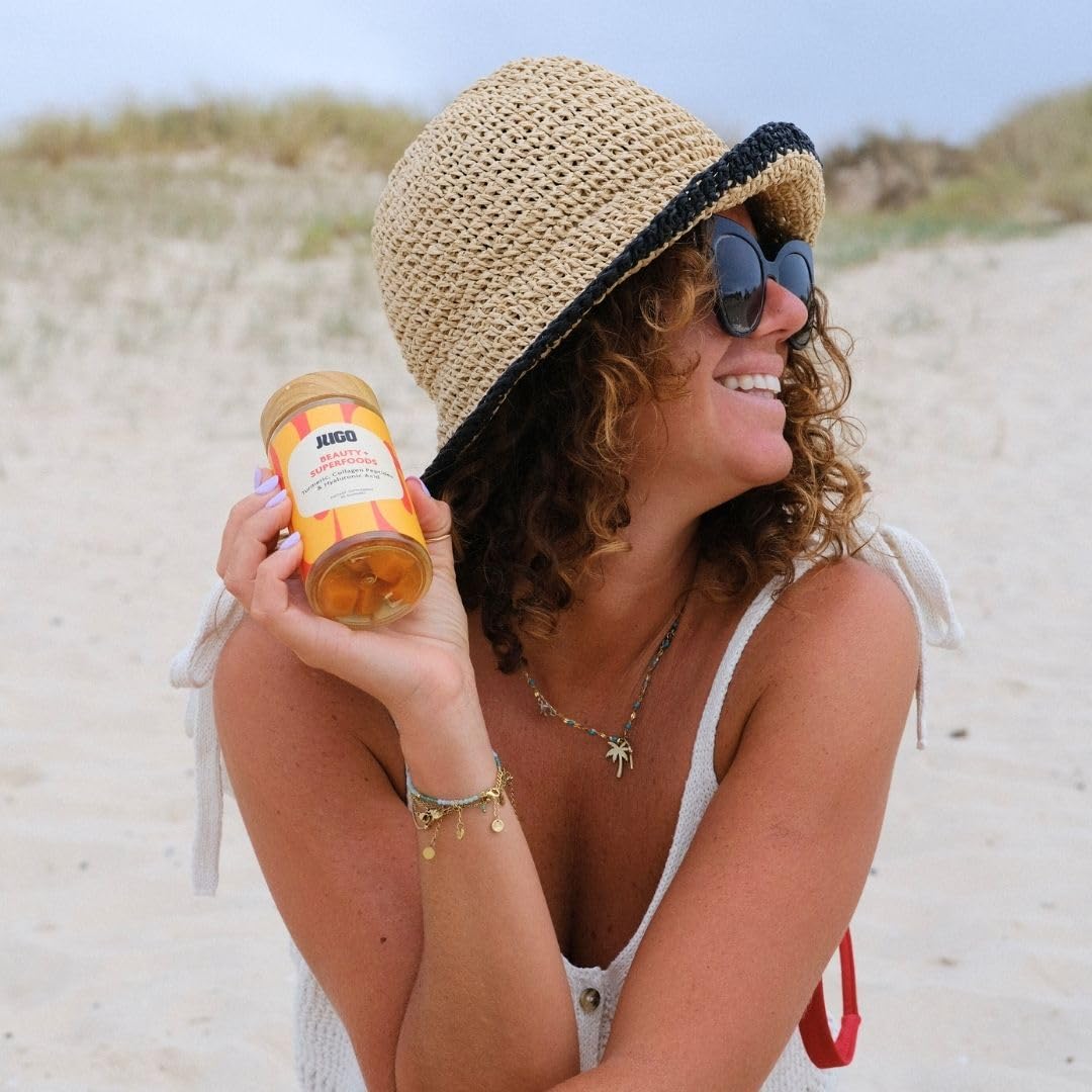 JUGO bottle shows non-GMO, dairy-free and soy-free attributes.