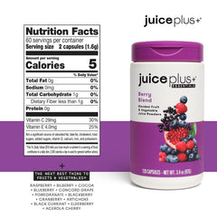 Pouring Juice Plus+ Berry Blend from the bottle for easy serving