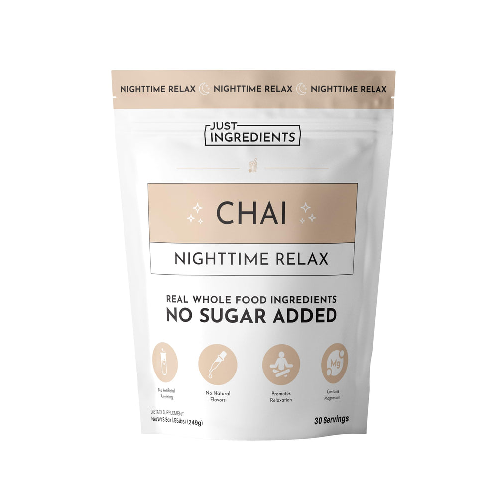 Just Ingredients Chai Nighttime Relax bottle beside a cozy mug for calm evenings.