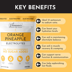 Coconut water and orange pineapple Electrolytes portrait emphasizing mineral blend