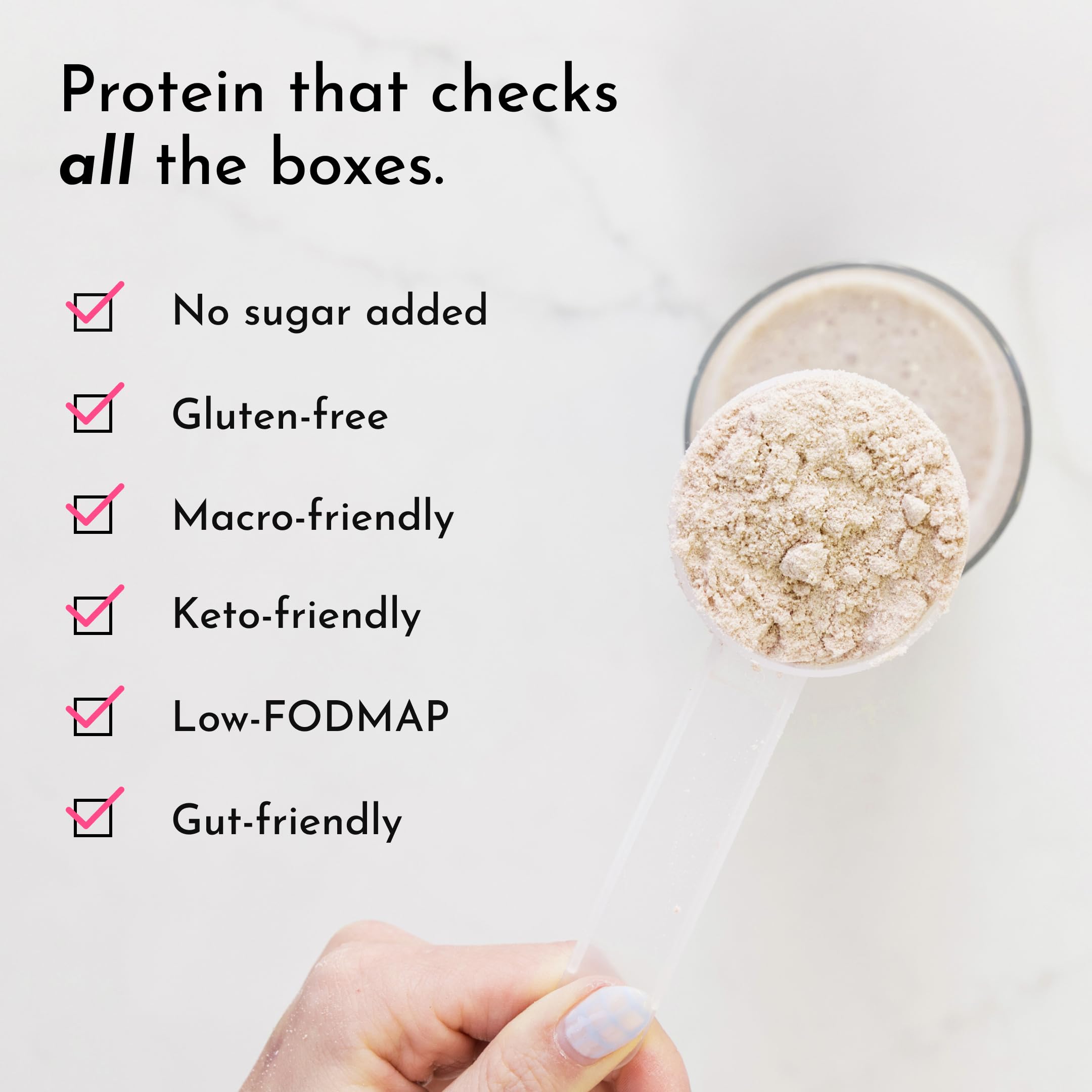 Pouring vanilla bean protein powder into a blender for smoothies.