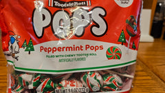 JYCONVSTO97 Tootsie Roll Pops packaging in modern white and red design, ideal for gifting.