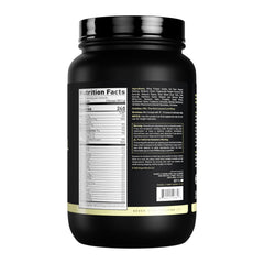 Pouring a Vanilla Cake shake from Kaged Clean Meal for fast nutrition.