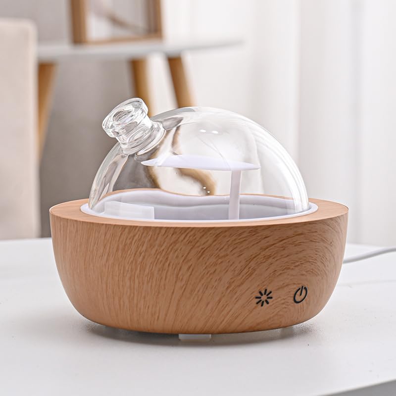 Kakoda hand-blown glass cover offers a unique decorative touch.
