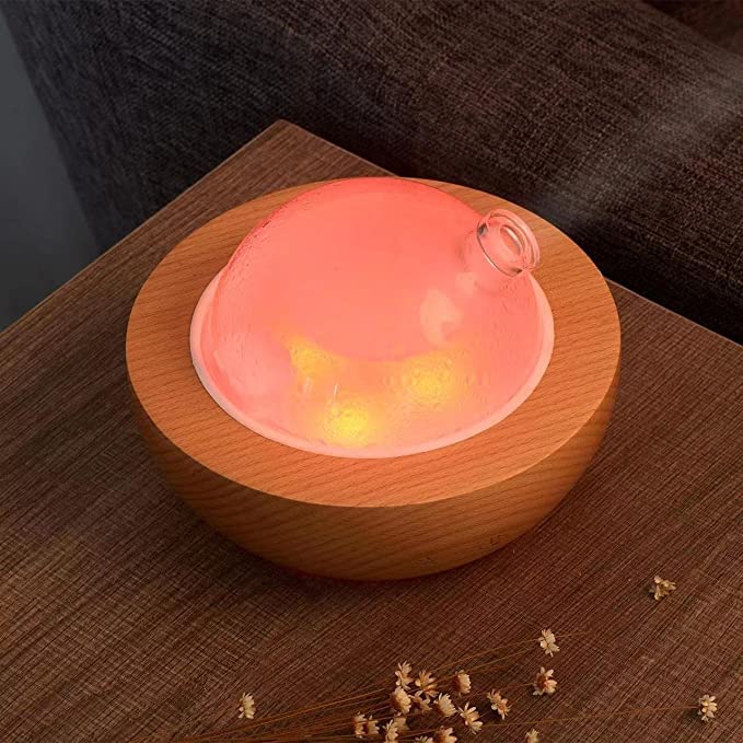 Kakoda diffuser displaying seven LED colors for mood lighting