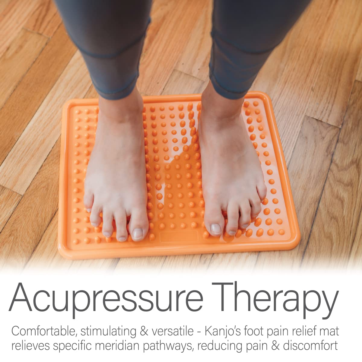 Kanjo mat in standing posture provides gentle acupressure during work.