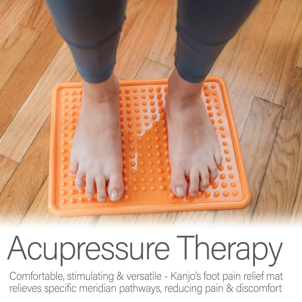 Kanjo mat in standing posture provides gentle acupressure during work.