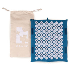 Kanjo memory foam foot mat, top view, for soothing foot relief.