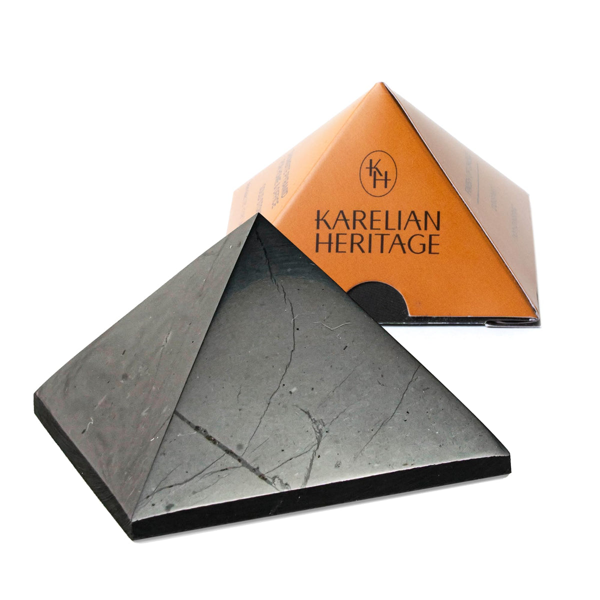Karelian Heritage shungite pyramid front view promotes calm and focus.