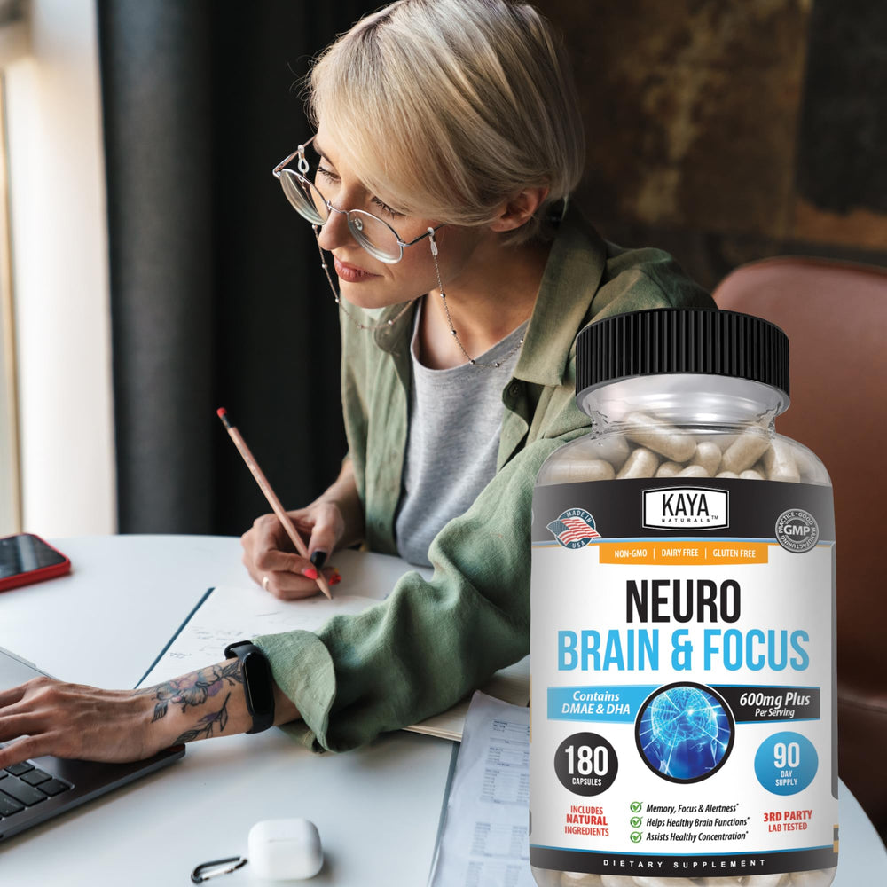 Person taking Kaya Naturals Neuro Brain capsule before work