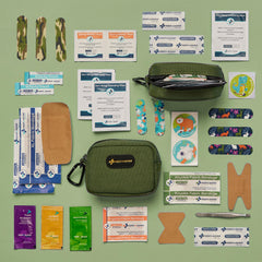 KEEP>GOING KeepGoing Kids Travel Kit stain- and water-resistant case in hand.