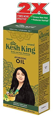 Kesh King oil application on scalp suggests relaxing routine and nourishment.