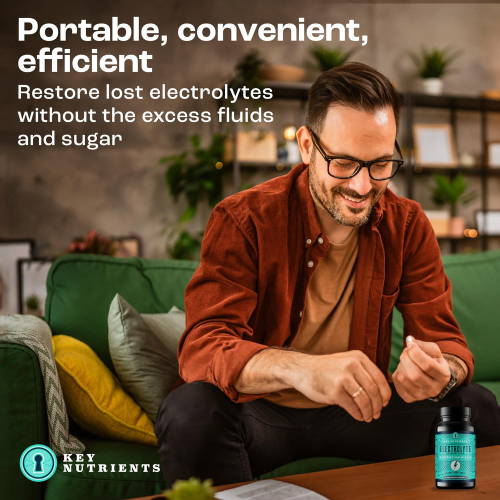 Pouring Key Nutrients Electrolyte Tablets into water for fast hydration