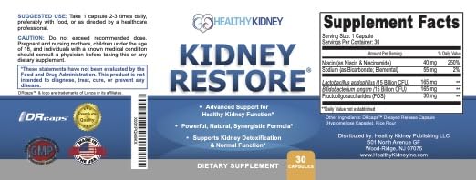 Lifestyle shot of user taking Kidney Restore capsules for daily kidney health support