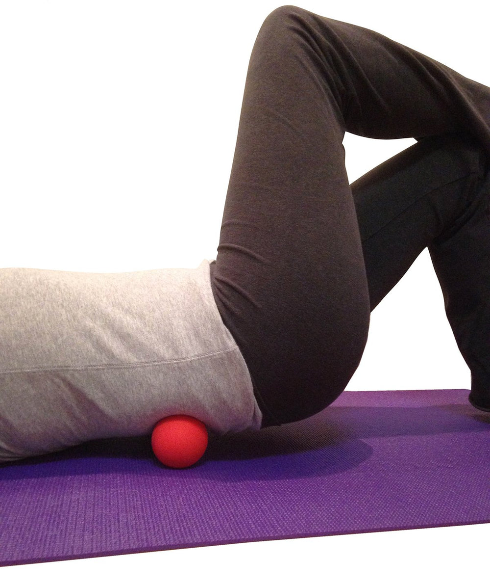 Kieba blue lacrosse ball on neck muscles for tension release
