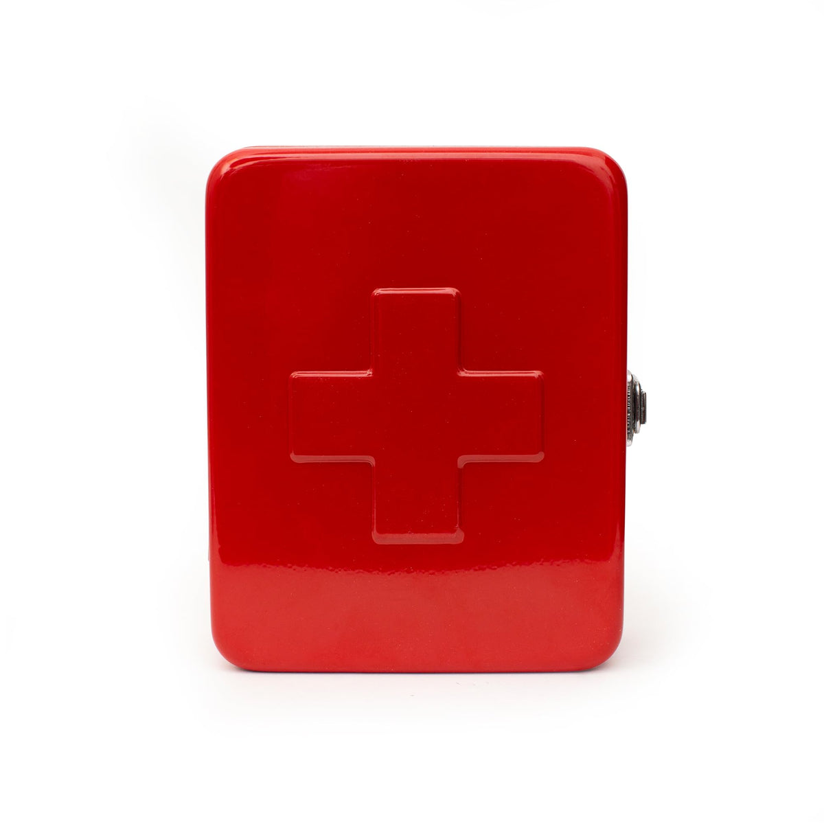 Kikkerland red steel first aid case closed, compact and sturdy for home use.
