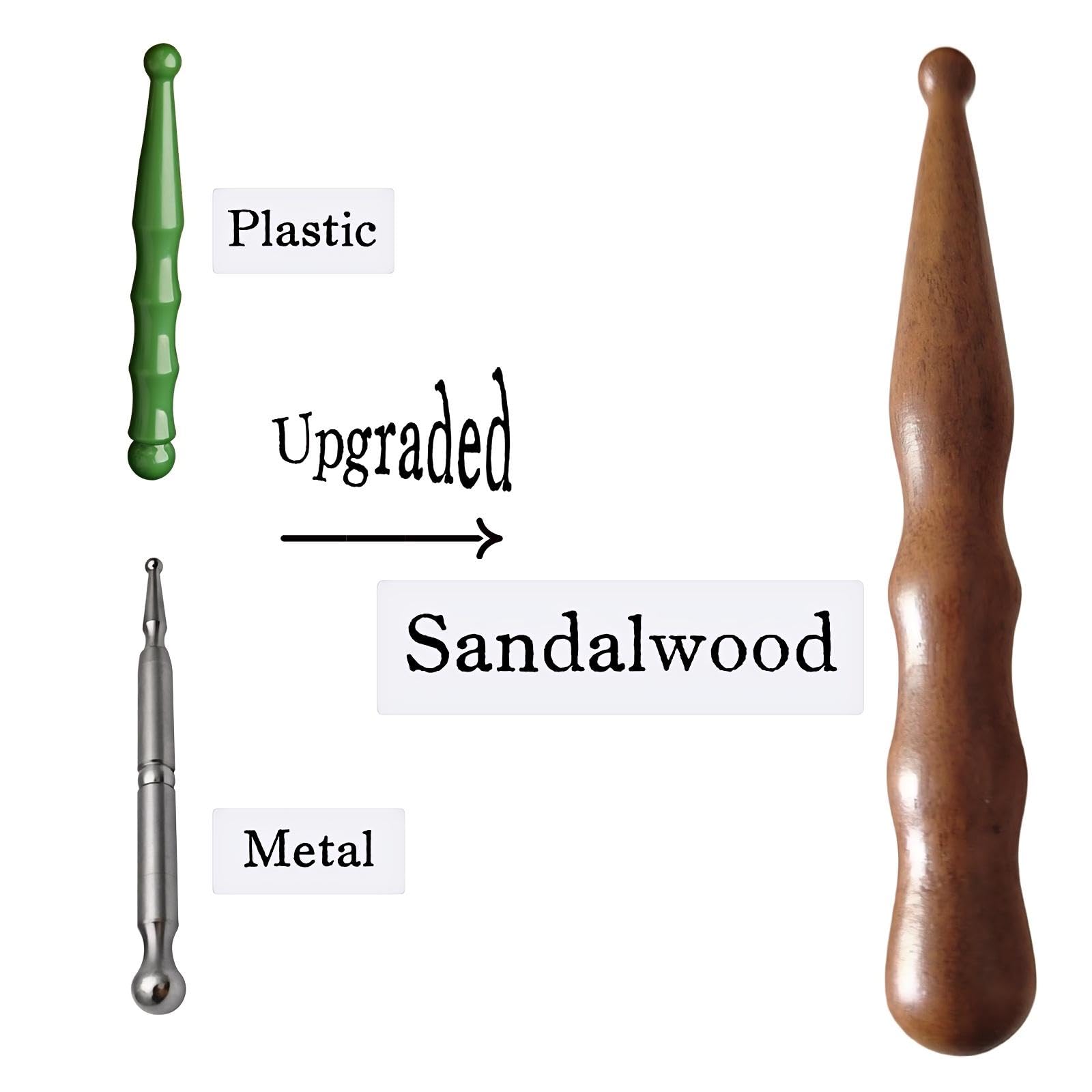 KINTEGOOD sandalwood acupoint pen handle close-up smooth grip during sessions.