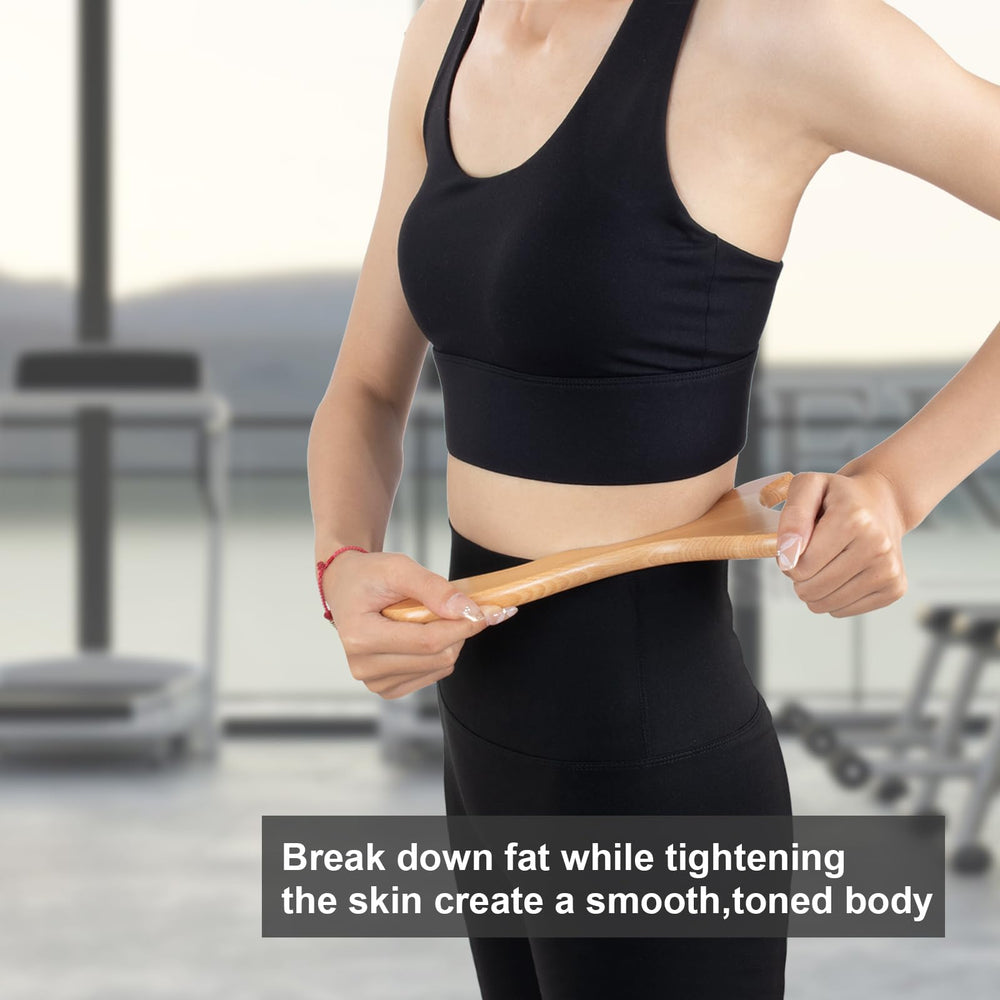 KintKita back massage stick easing tight shoulders and improving blood flow.
