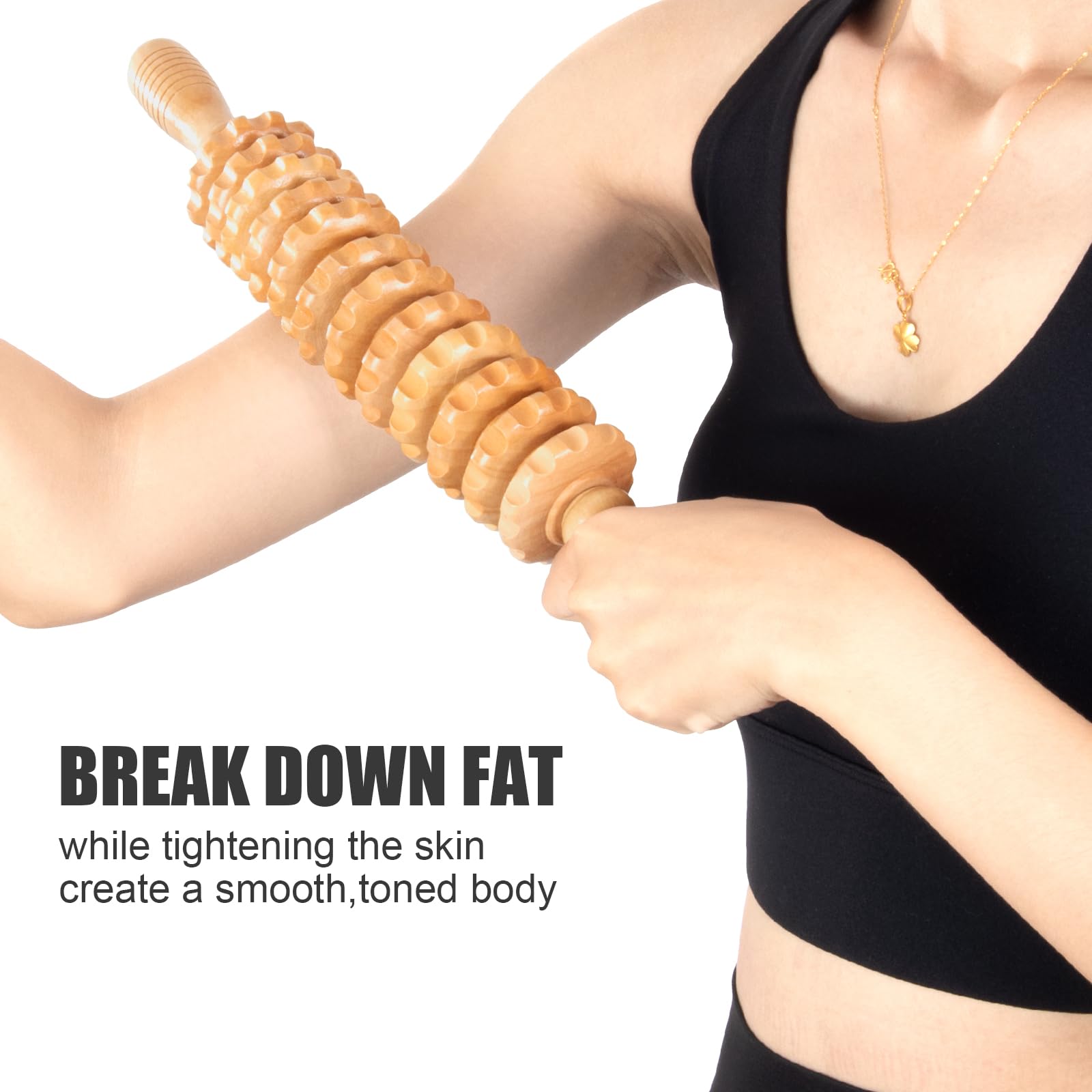 KintKita Wood Therapy Roller used on shoulder area for muscular relief.