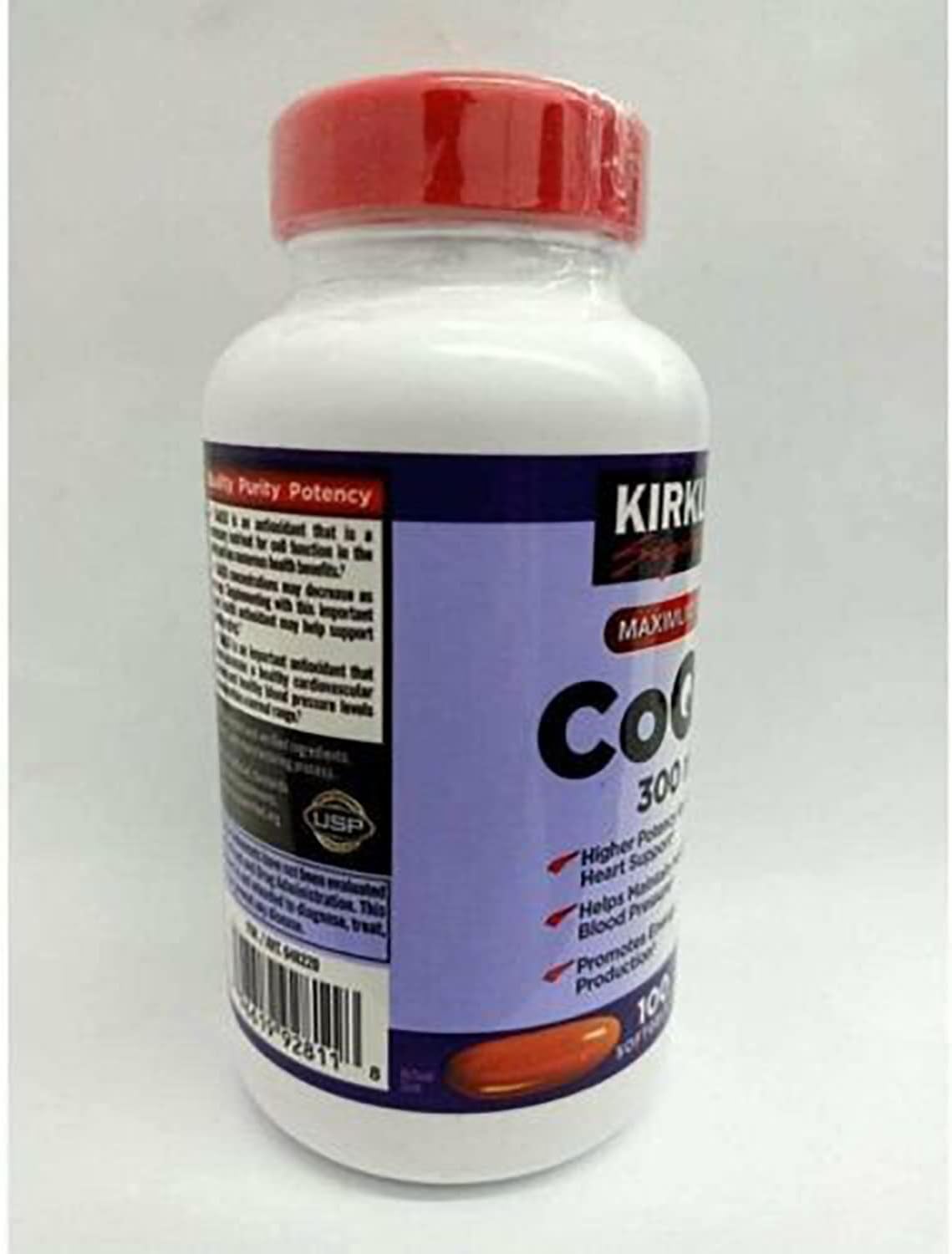 Kirkland CoQ10 softgels beside a glass of water, simple addition to routine