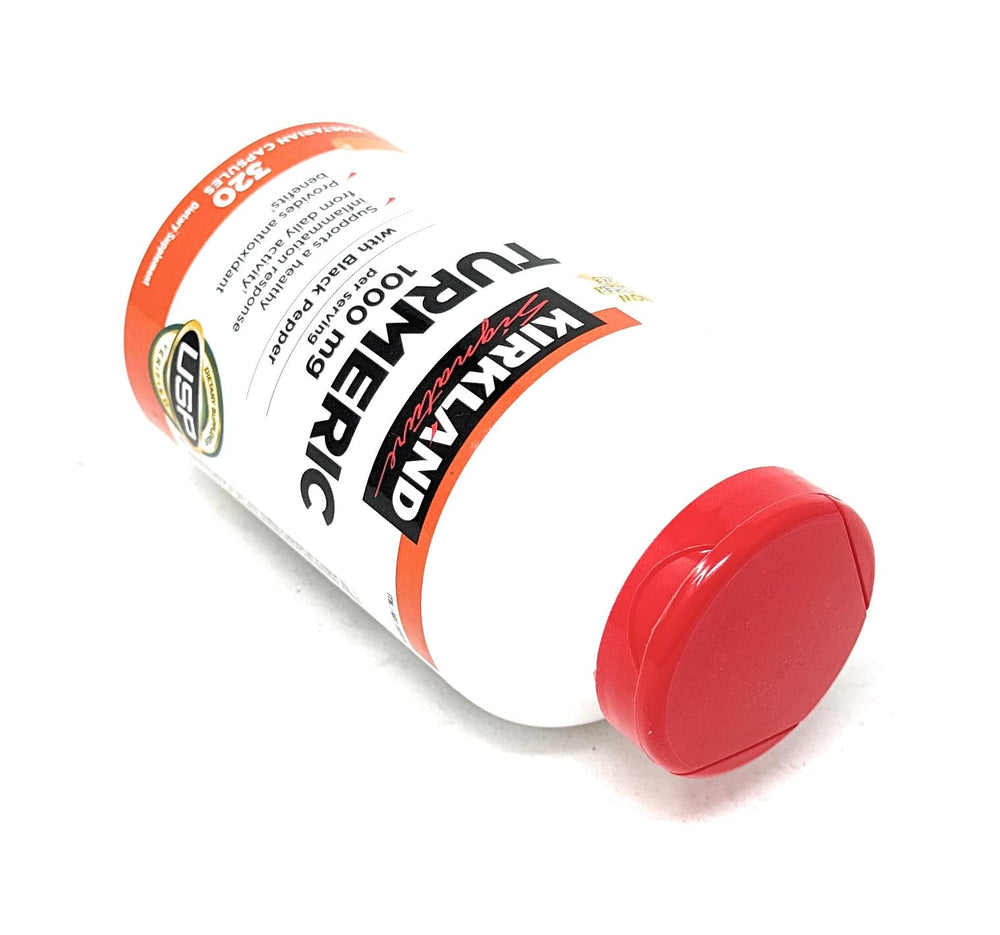 KIRKLAND Turmeric bottle in use during daily routine.