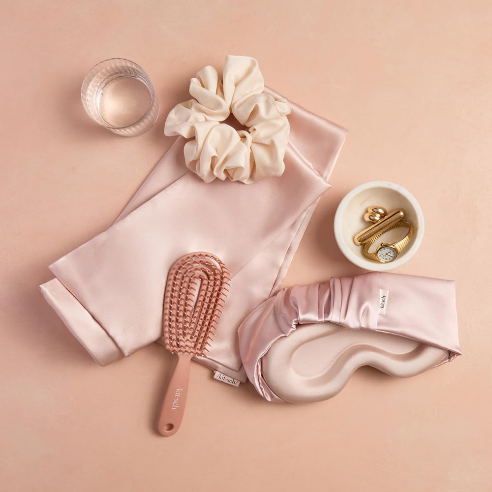 Kitsch blush-colored mask serves as a stylish travel and gift essential.