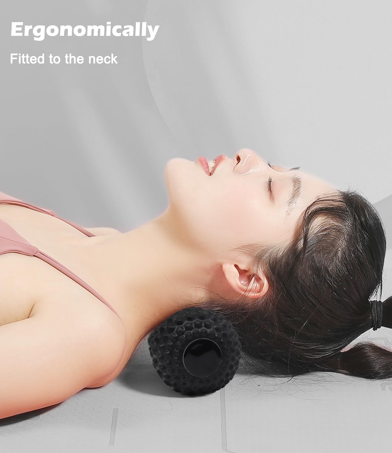 KitWILD massage ball on bed demonstrates easy self-use