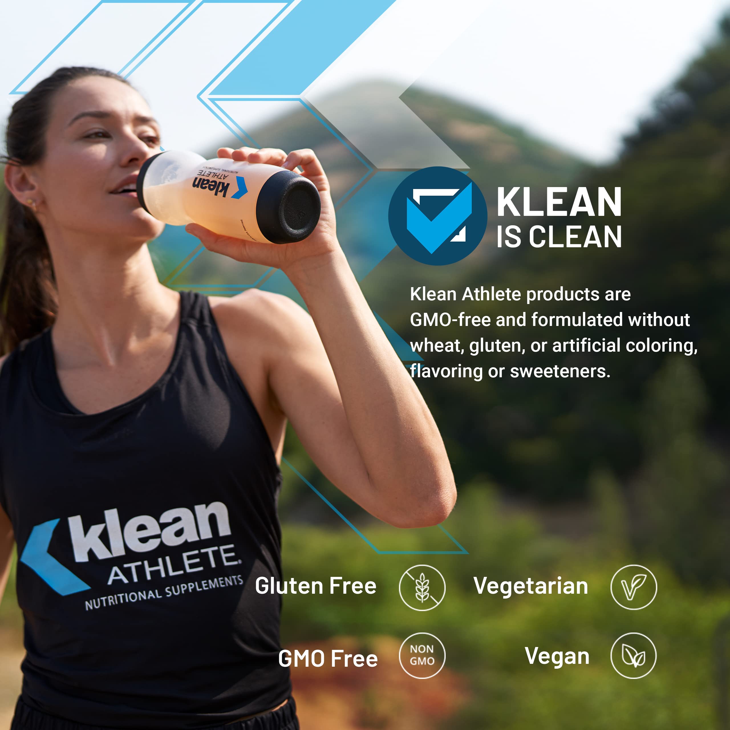Klean Athlete Klean BCAA + Peak ATP being mixed in a glass of water.