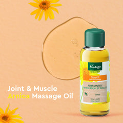 Kneipp Arnica massage oil being poured for targeted muscle relief