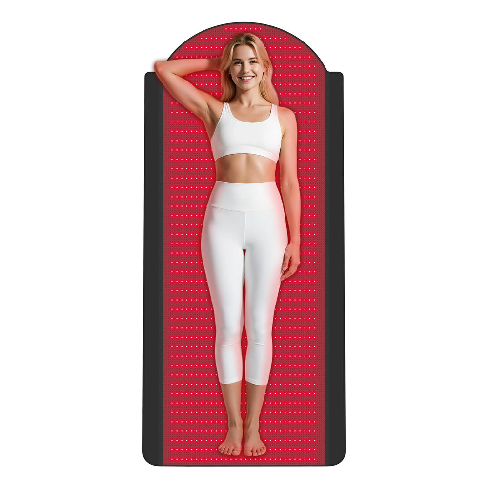Knocoka red light therapy mat laid out for full-body use, 71x33 inches.