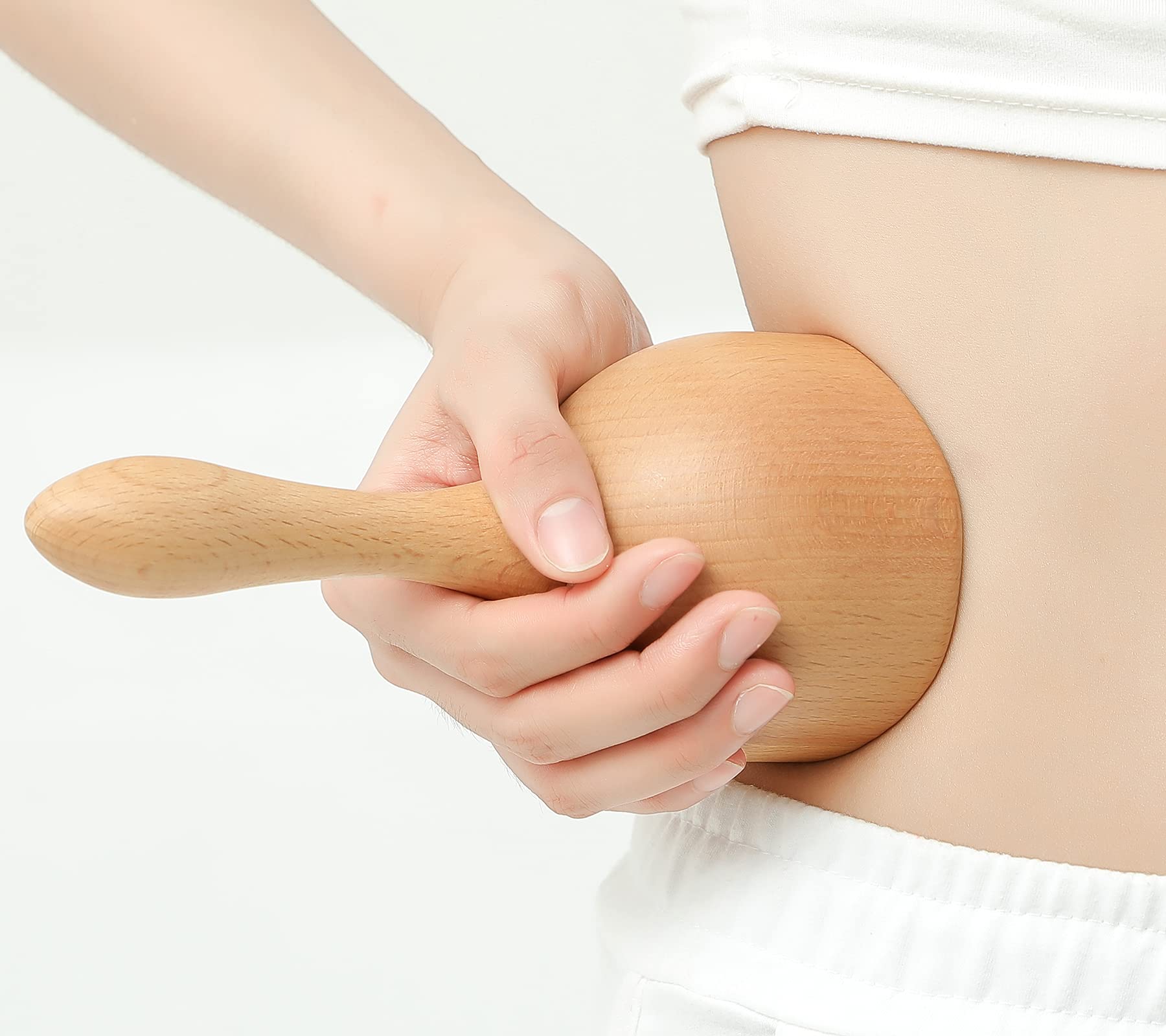Komogir dual-curve wood cup supports vacuum-inspired body contouring