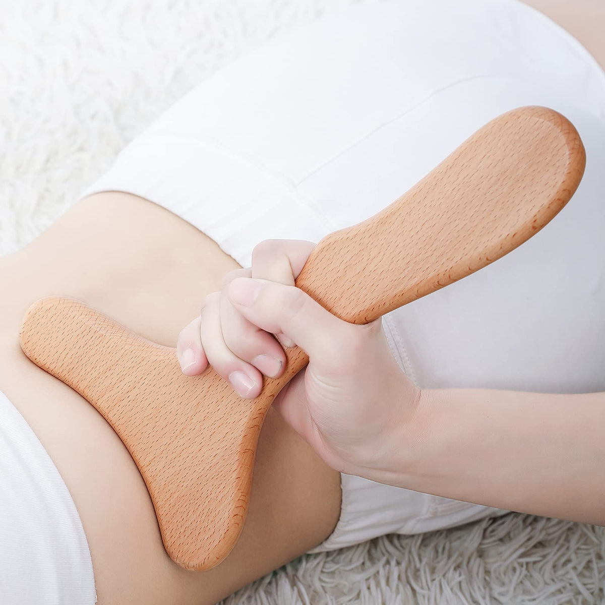 Komogir wood therapy tool with ergonomic handle for comfortable, targeted massage.
