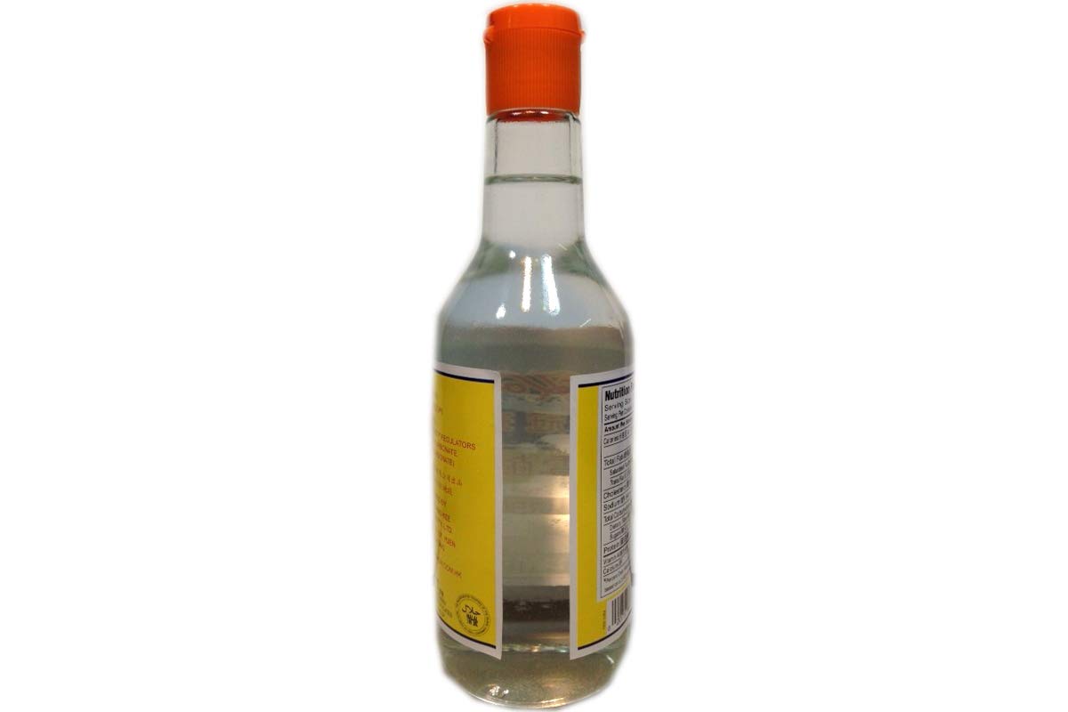 Koon Chun Lye Water pour showing clear liquid, ideal for culinary uses.