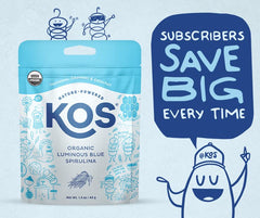 KOS Blue Spirulina powder being scooped into a smoothie for color and protein boost.